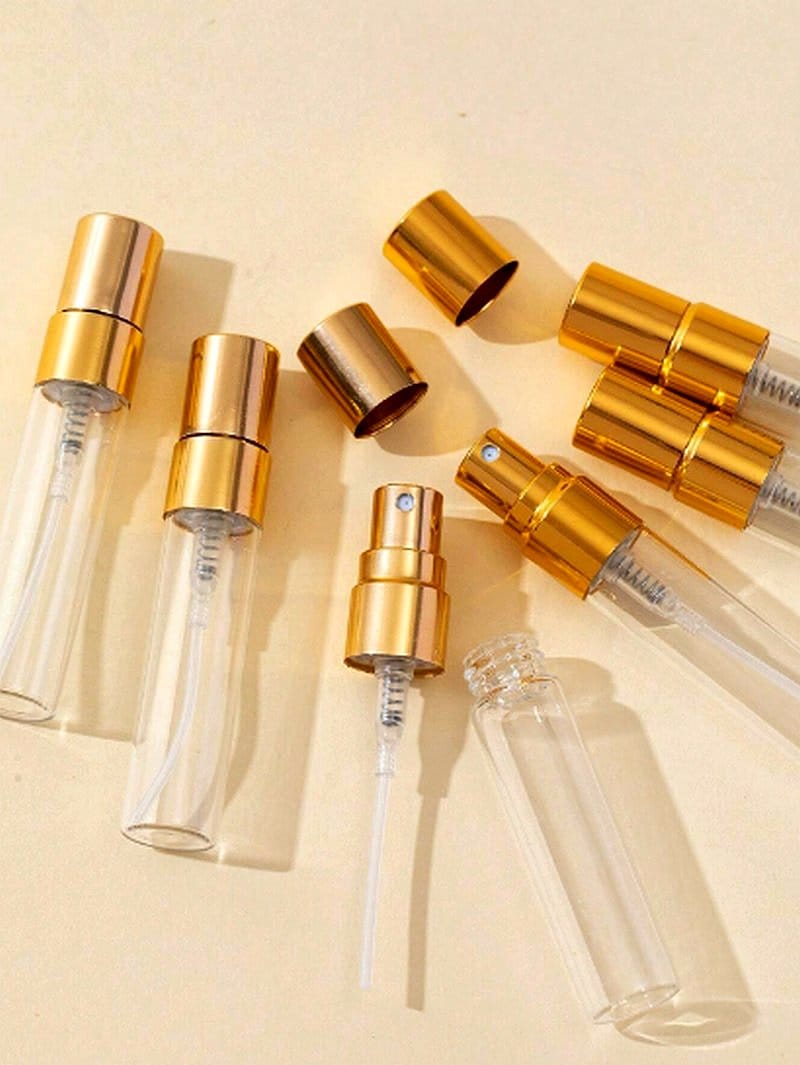 زجاجات عطر فاخرة قابلة لإعادة التعبئة بتصميم ذهبي أنيق